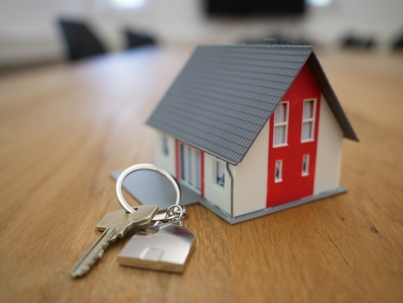 small house model with house keys